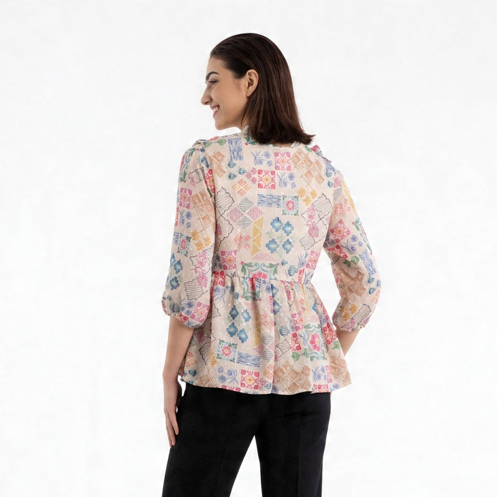 Printed Peplum Top With Ruffle and Tie-Up Neck Detail