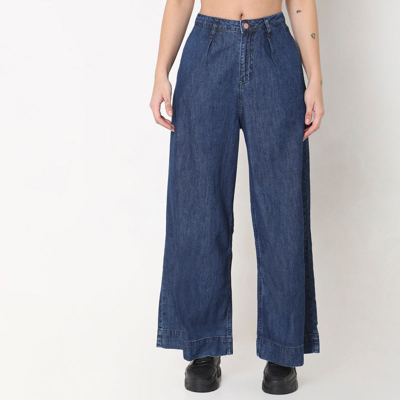 Women Wearing Wide Leg Solid High Rise Jean