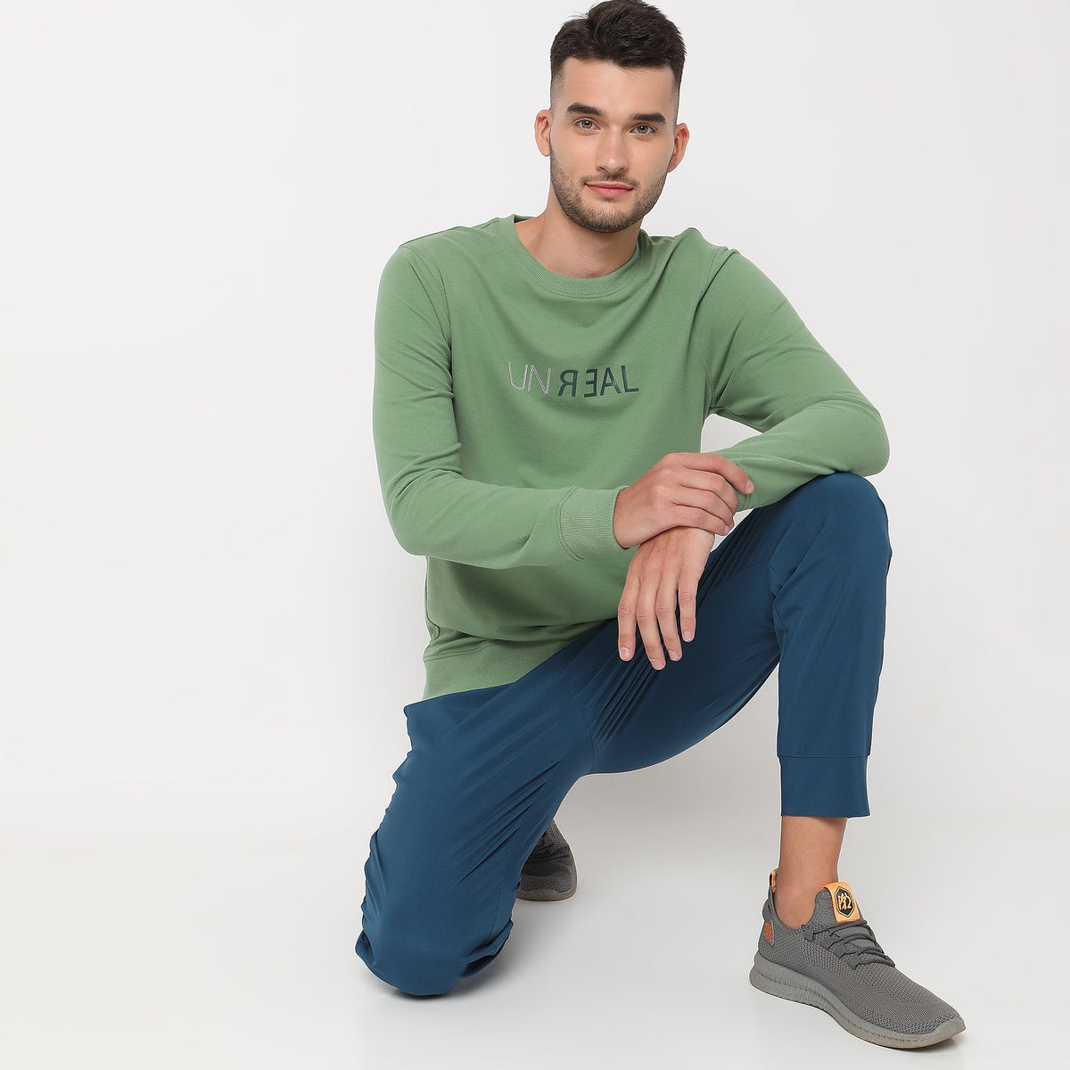 Men Wearing Regular Fit Solid Sweat Tees