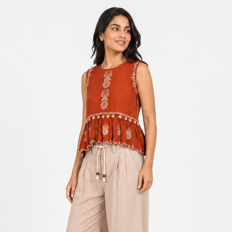 Embroidered Peplum Top
