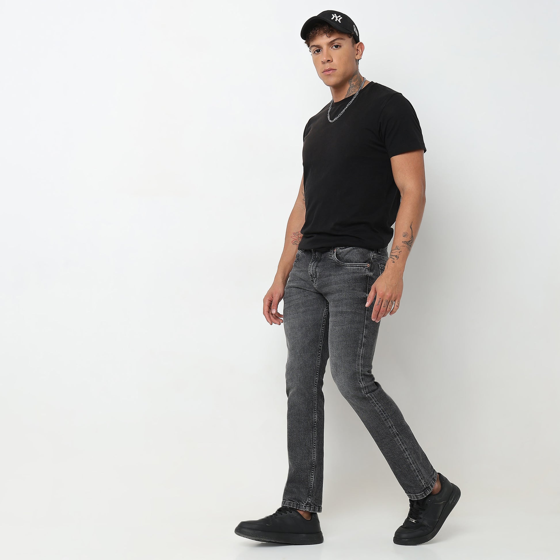 Tapered Fit Solid Mid Rise Jeans