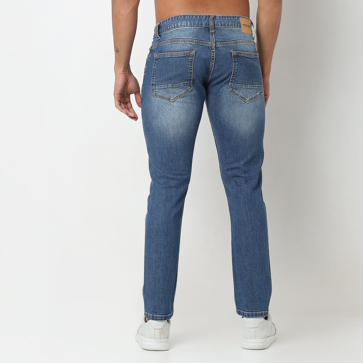 Tapered Fit Solid Mid Rise Jeans