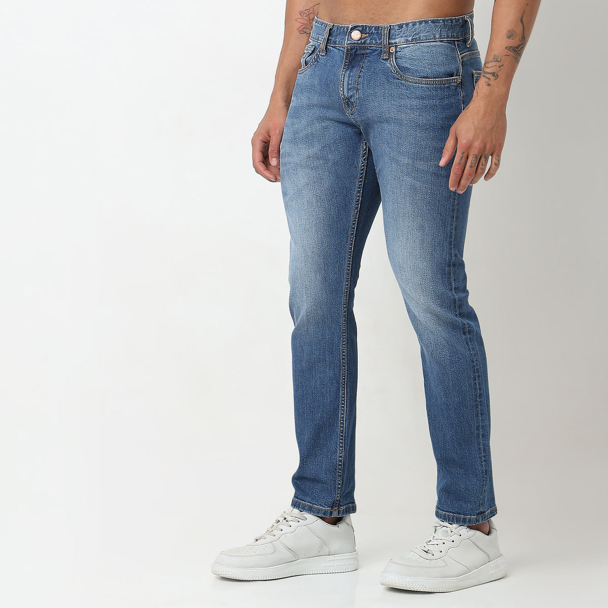 Tapered Fit Solid Mid Rise Jeans