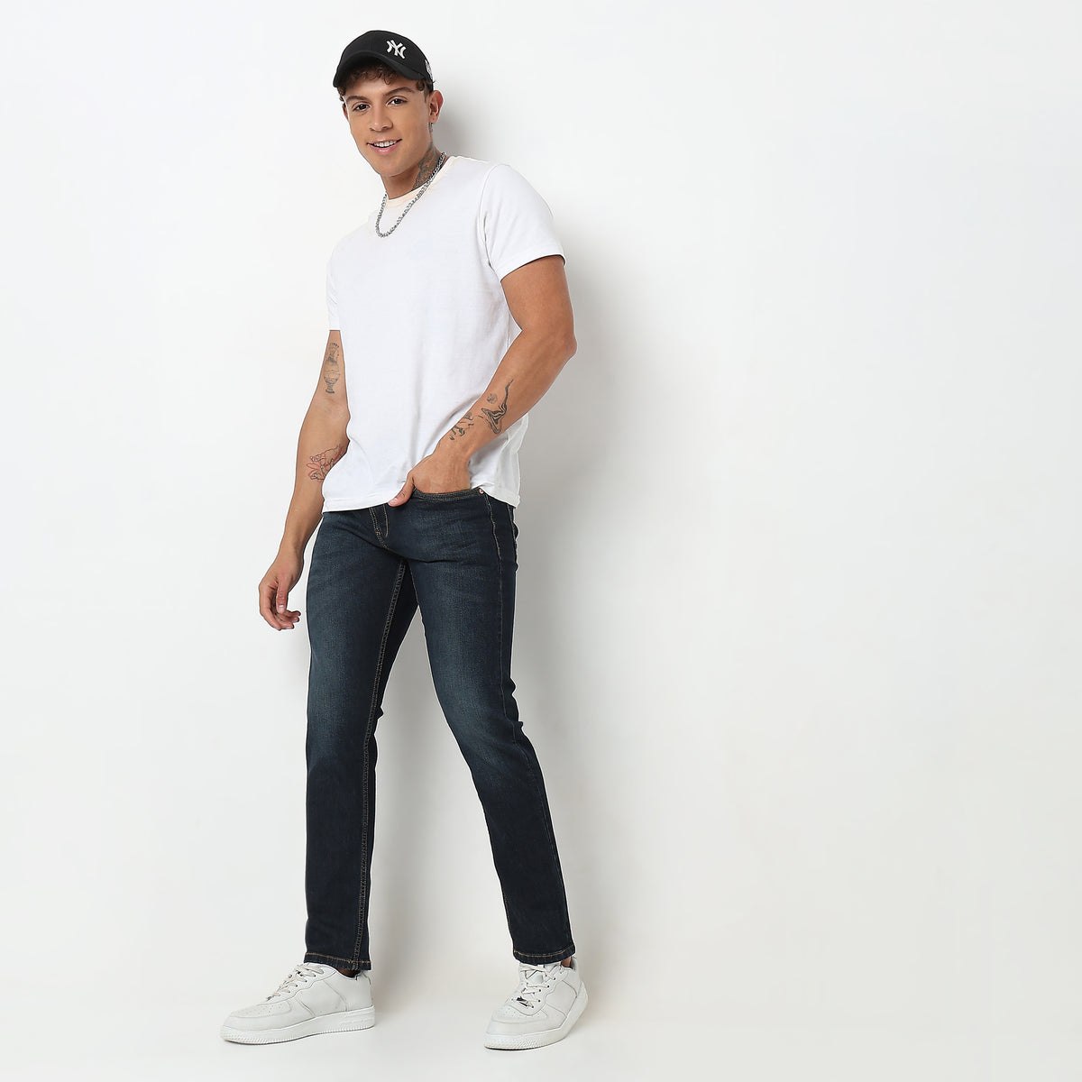 Tapered Fit Solid Mid Rise Jeans