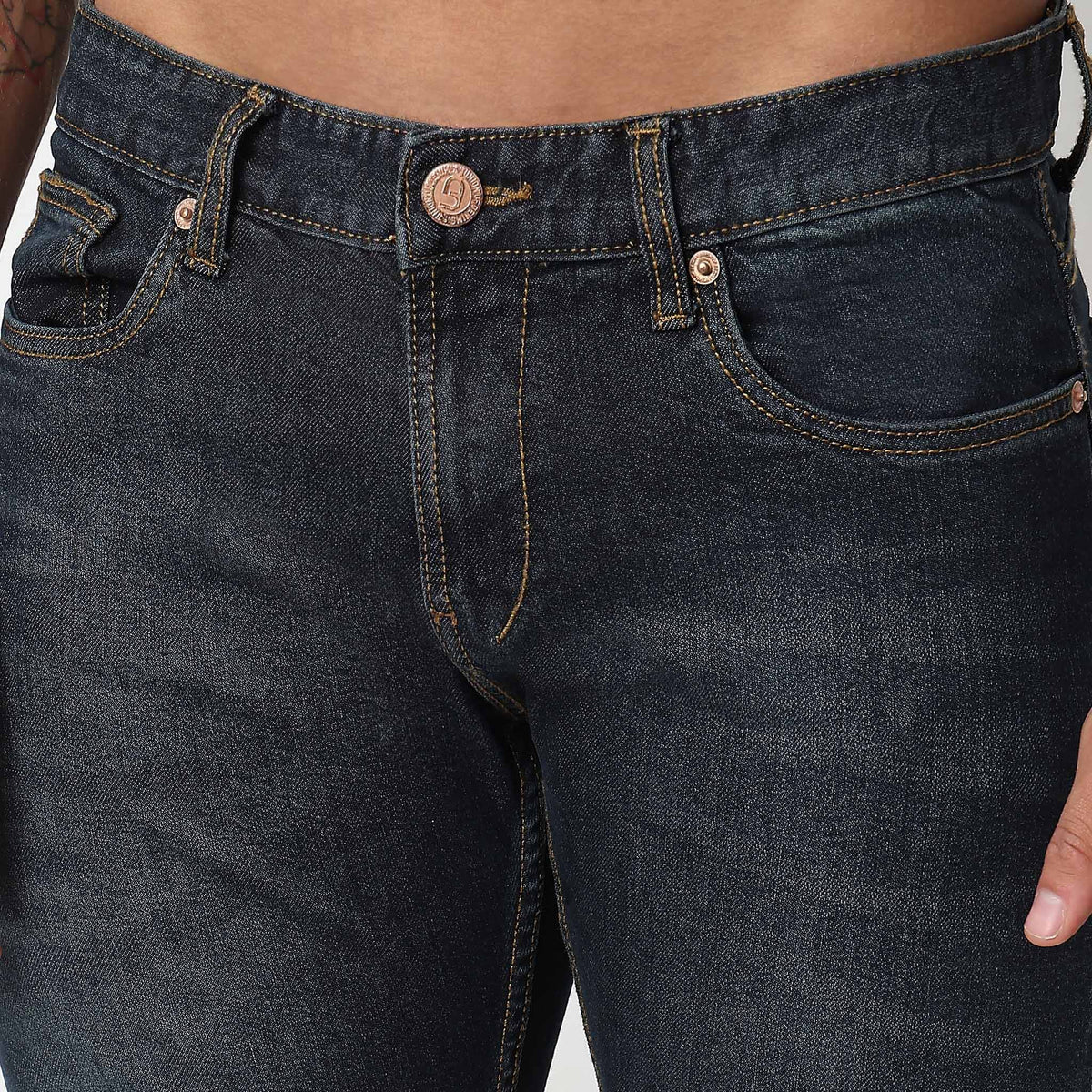 Tapered Fit Solid Mid Rise Jeans