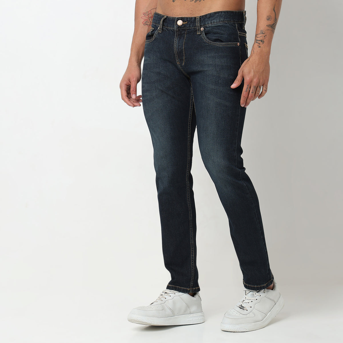 Tapered Fit Solid Mid Rise Jeans