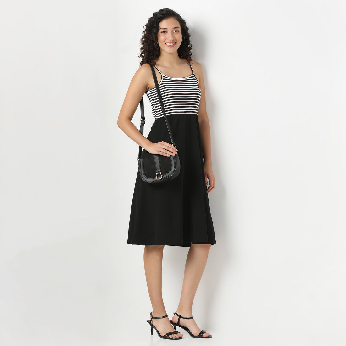Betty Flared Sleeveless Solid Dress.