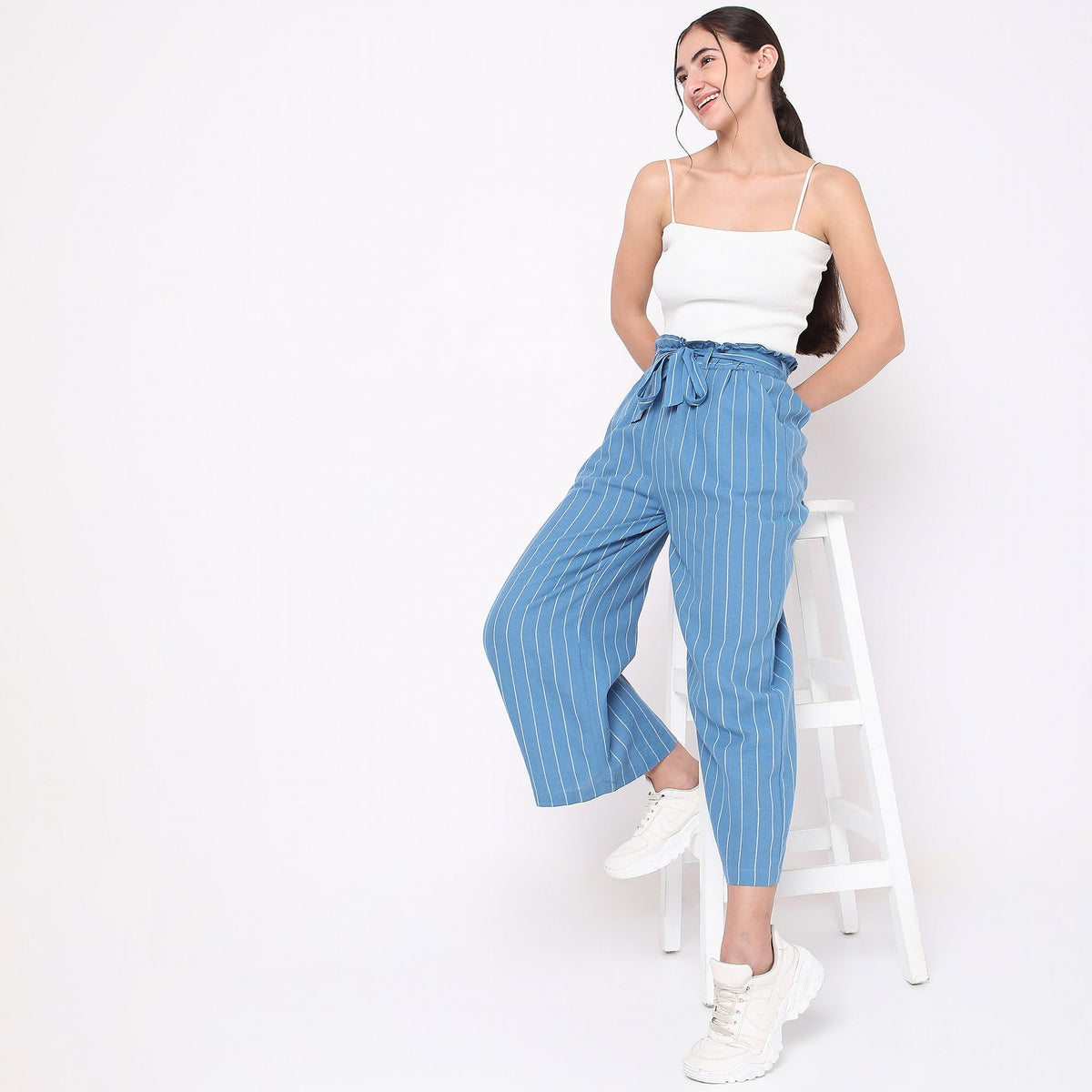 Women Wearing Regular Fit Striped High Rise Palazzo