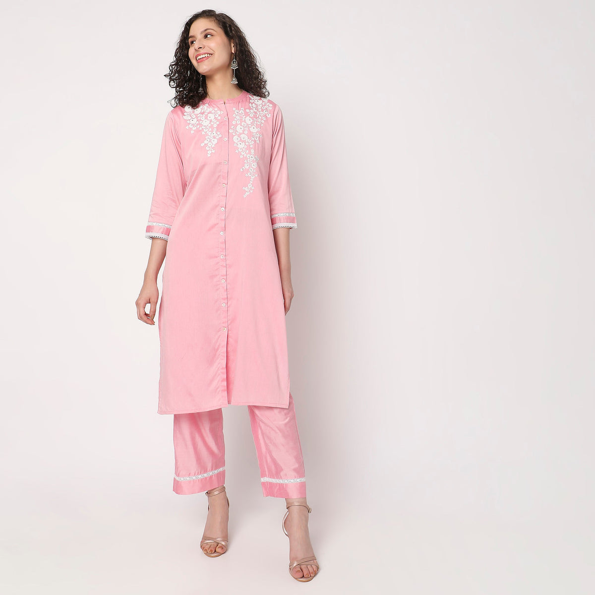 Women Wearing Straight Fit Embroidered Kurta