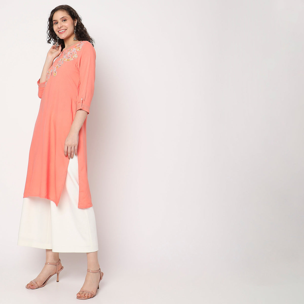 Women Wearing Flare Fit Embroidered Kurta