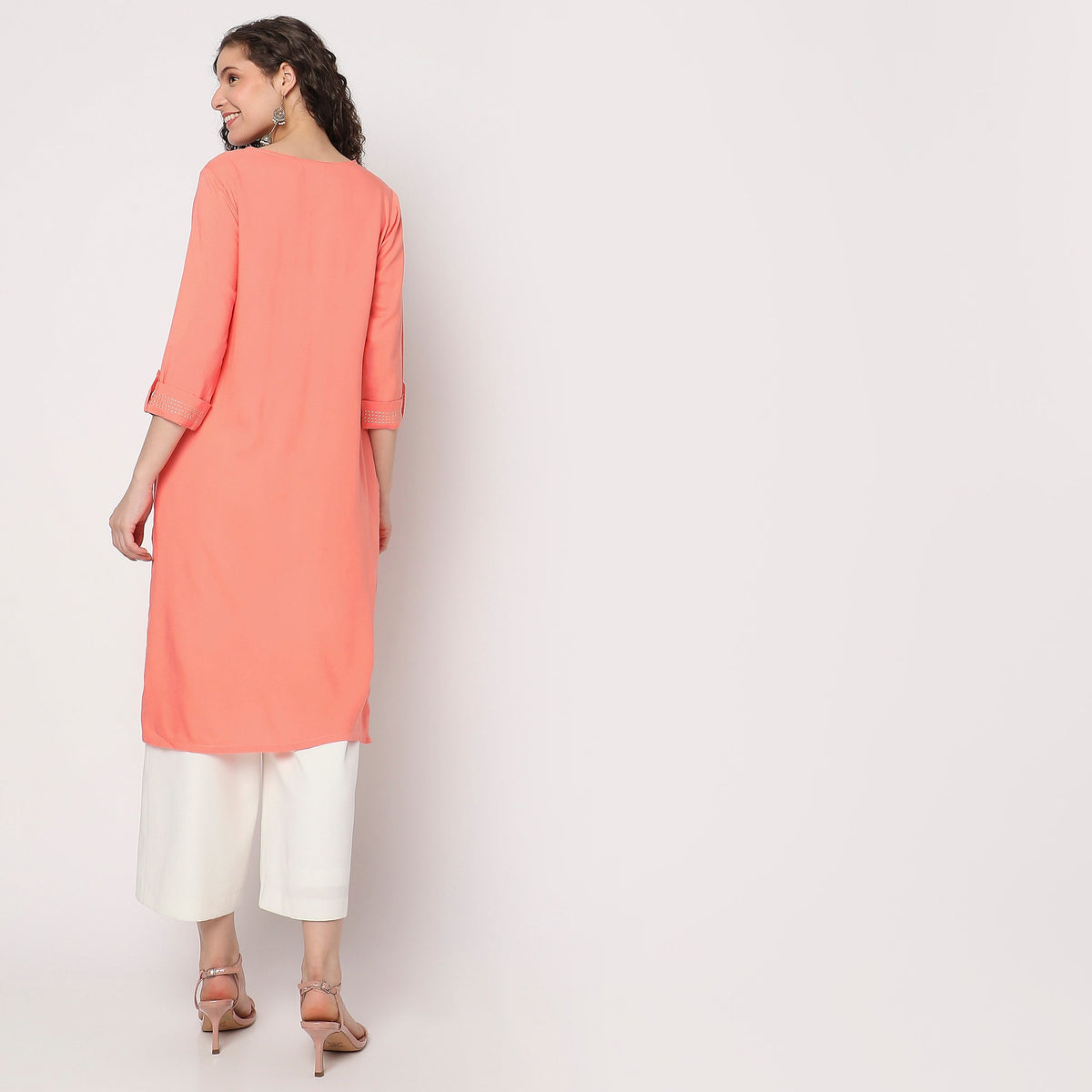 Women Wearing Flare Fit Embroidered Kurta