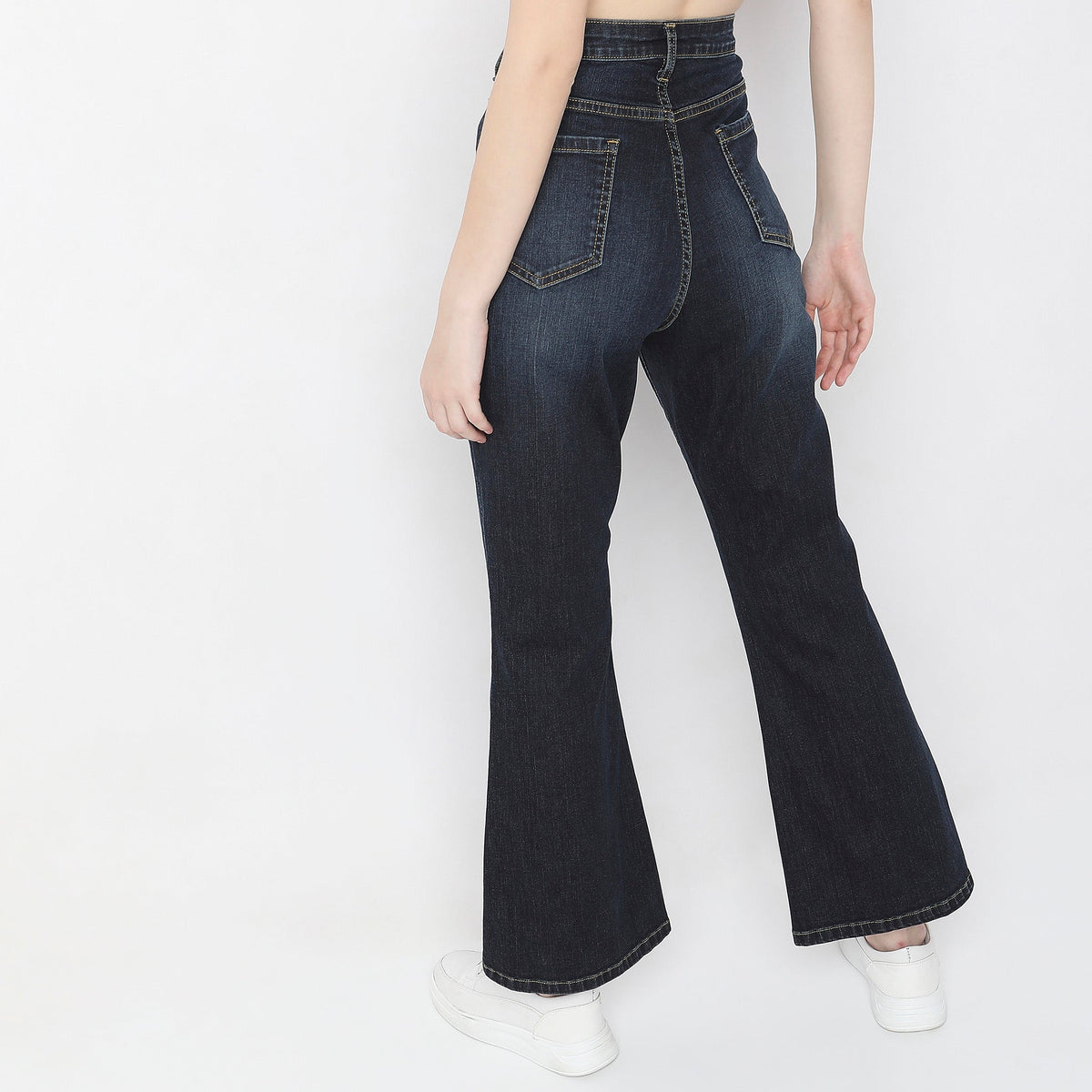 Women Wearing Boot Cut Solid High Rise Jean