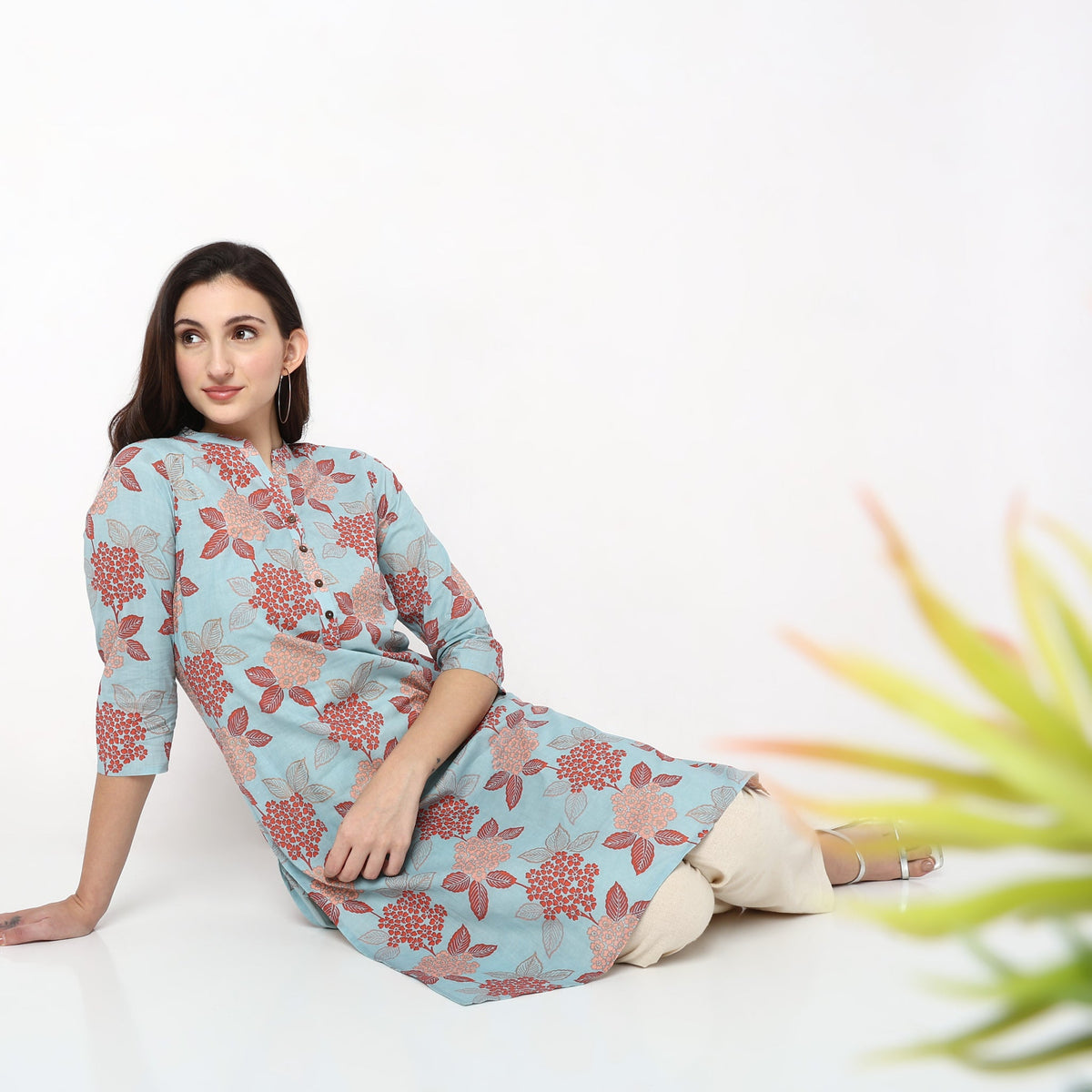 Women Wearing Straight Fit Printed Kurta