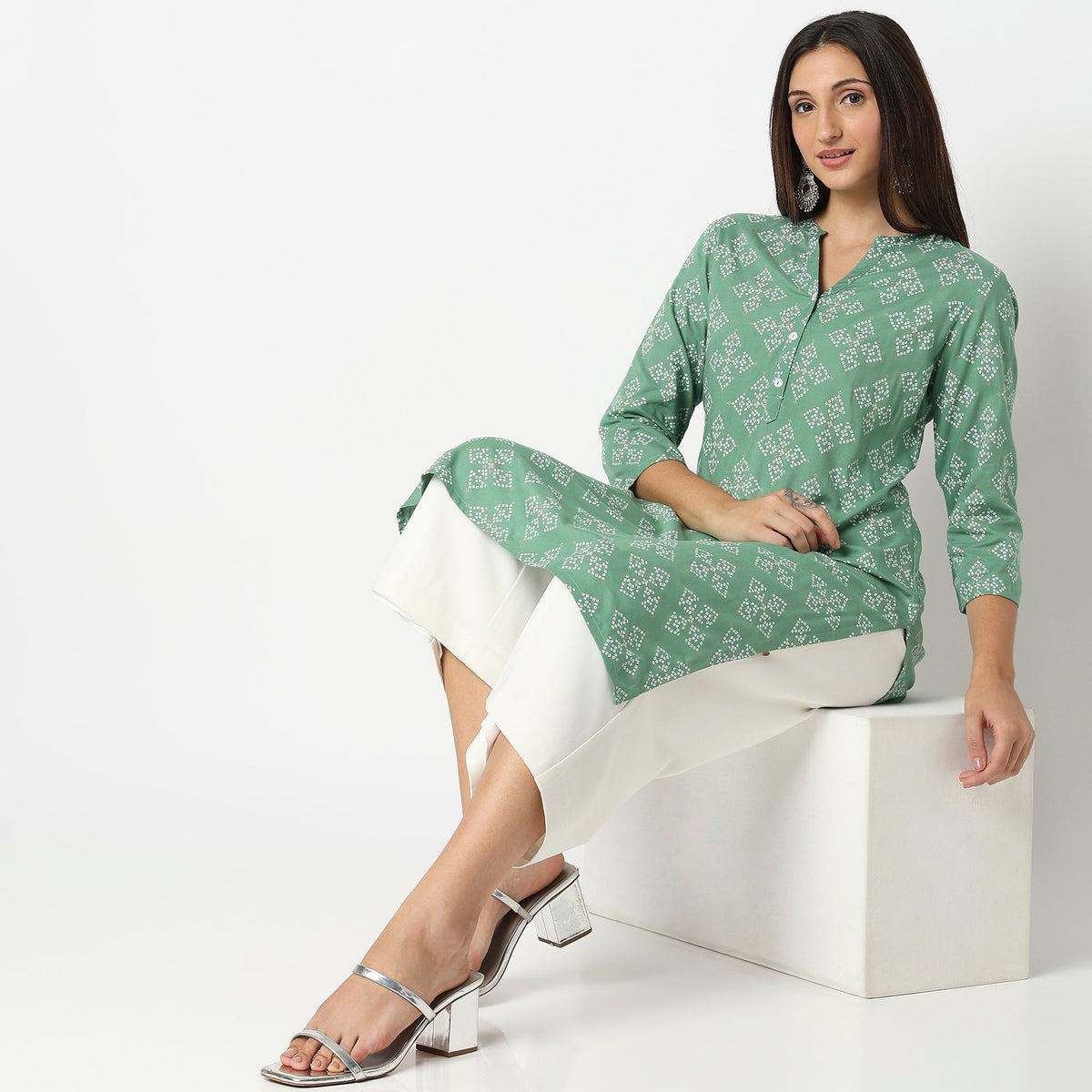 Women Wearing Straight Fit Printed Kurta