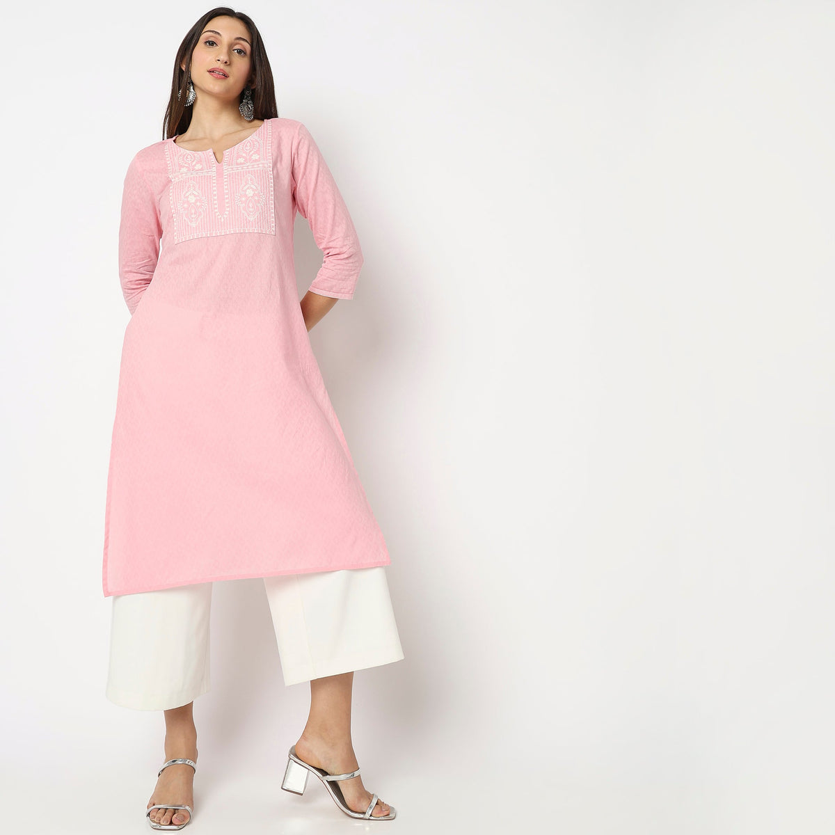 Women Wearing Straight Fit Embroidered Kurta