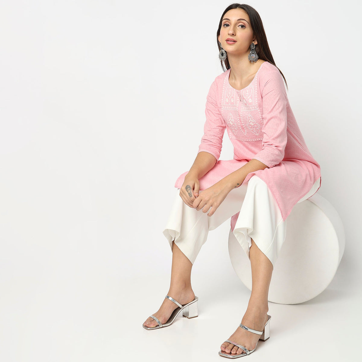 Women Wearing Straight Fit Embroidered Kurta