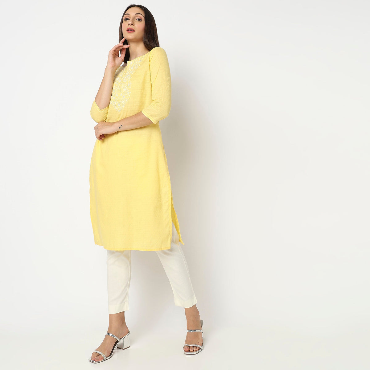 Women Wearing Straight Fit Embroidered Kurta