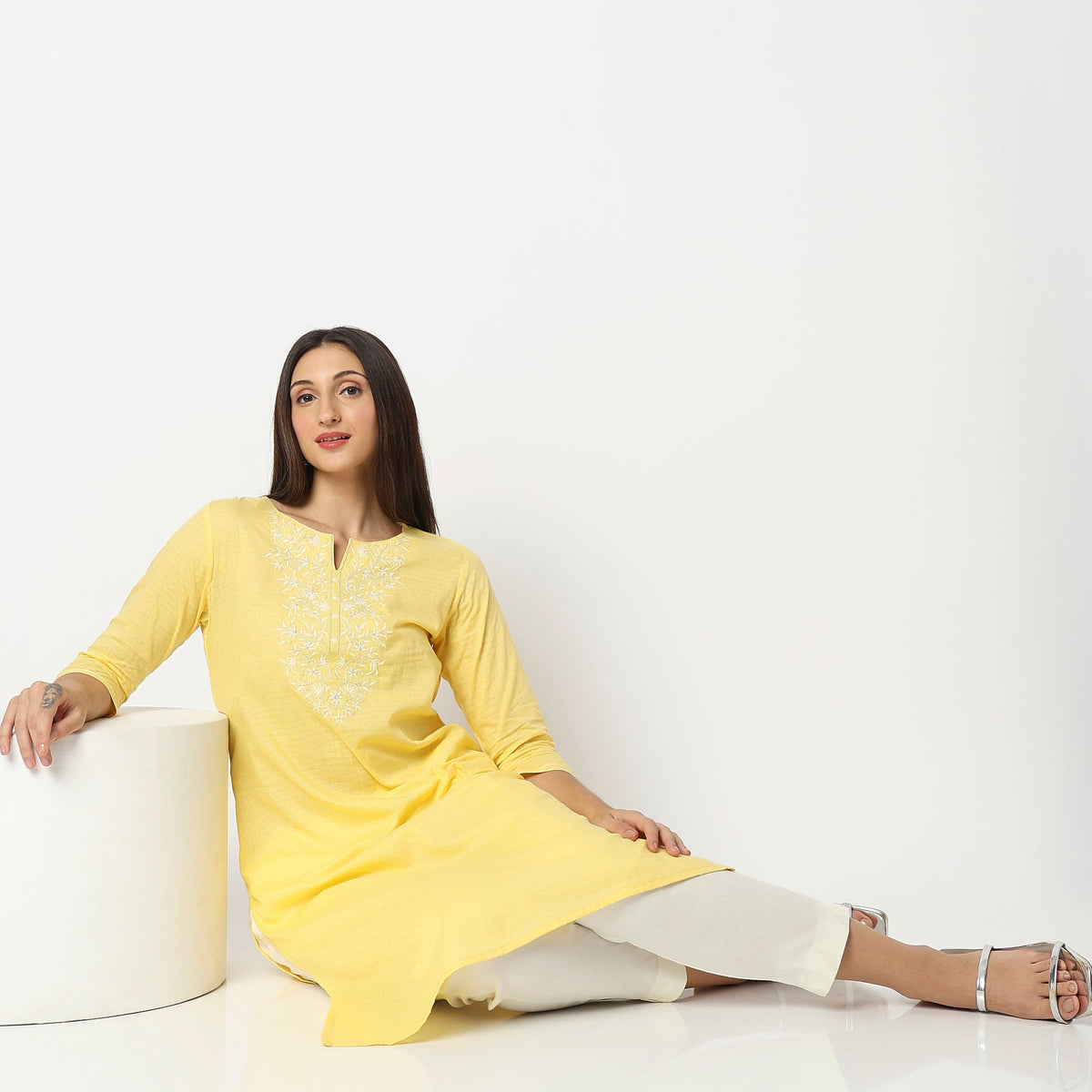 Women Wearing Straight Fit Embroidered Kurta