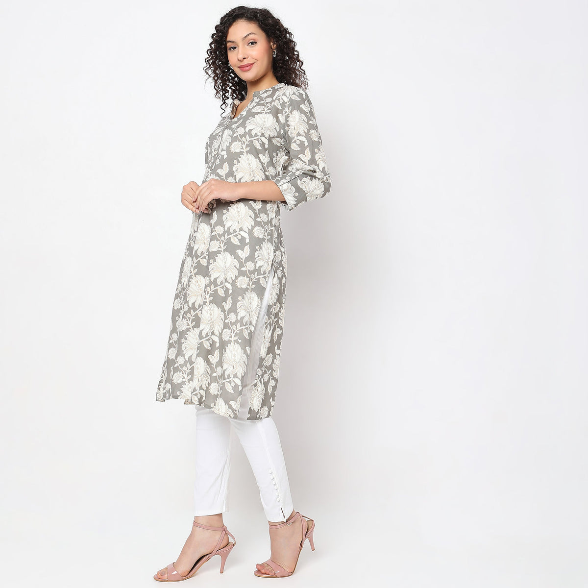 Women Wearing Straight Fit Floral Kurta