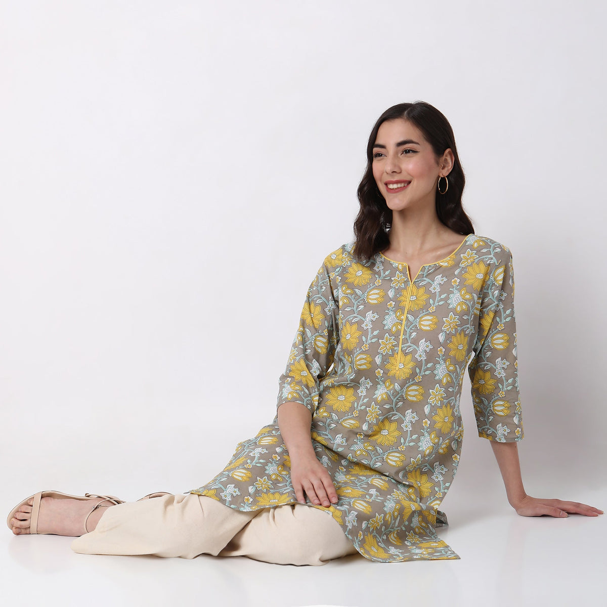 Women Wearing Straight Fit Floral Kurta