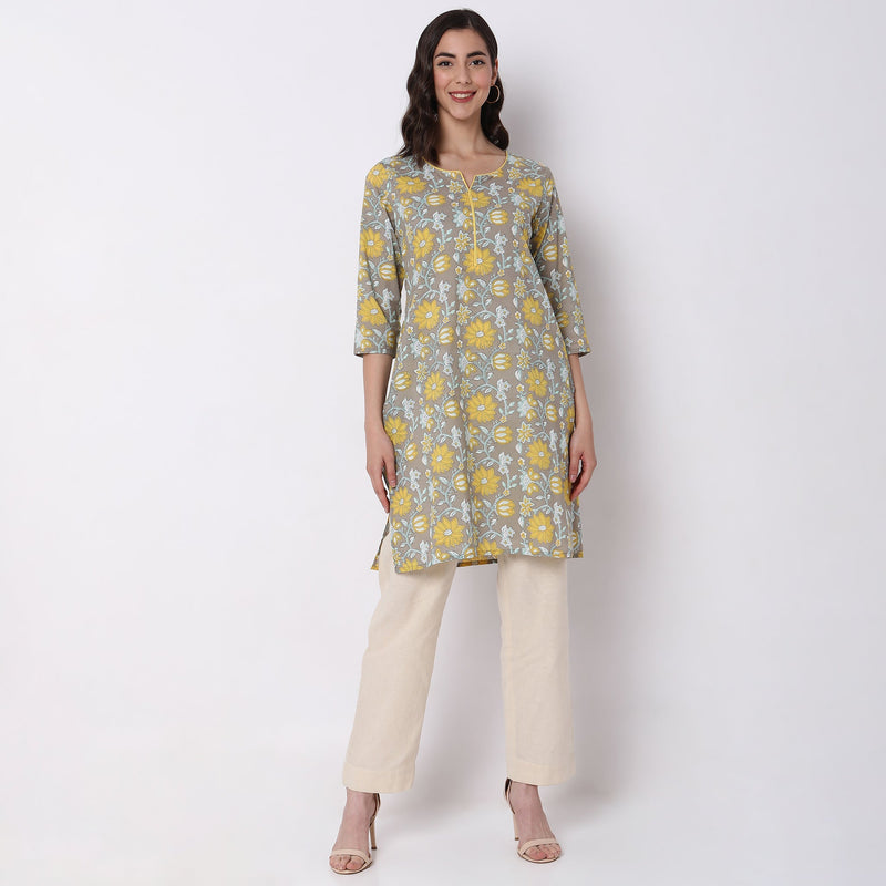 Women Wearing Straight Fit Floral Kurta