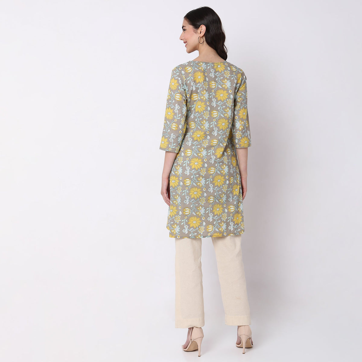 Women Wearing Straight Fit Floral Kurta