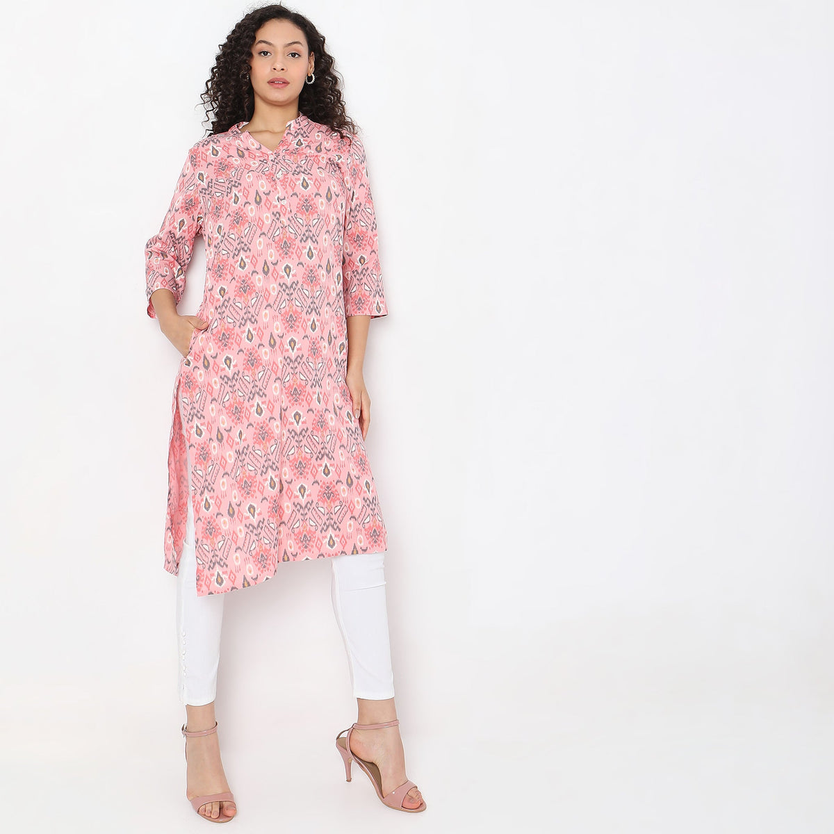 Women Wearing Straight Fit Floral Kurta