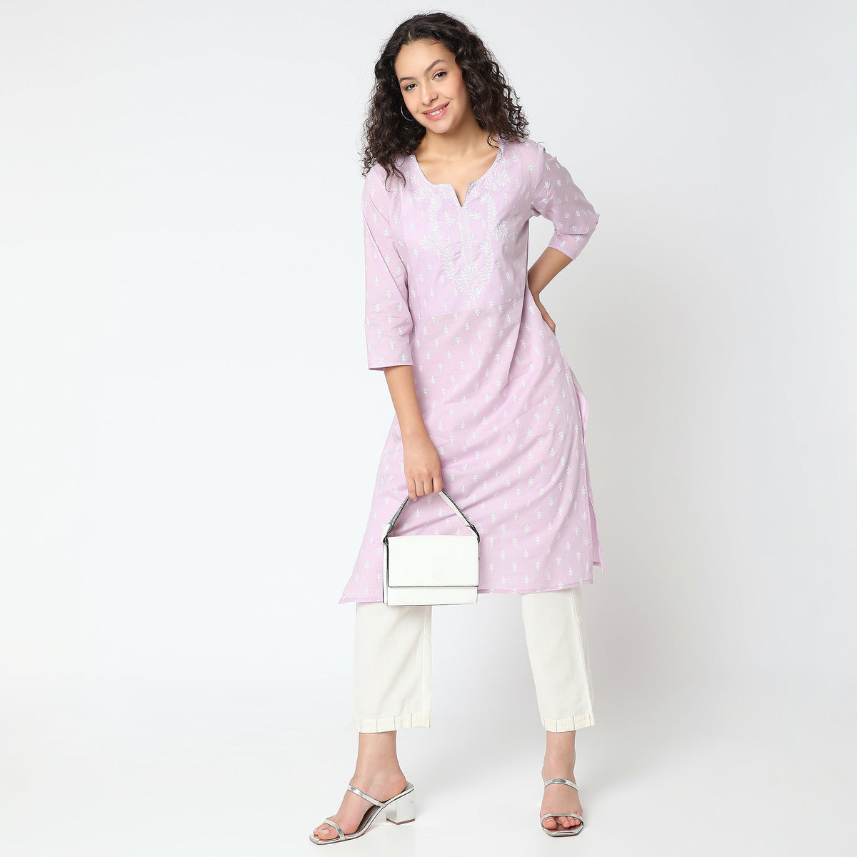 Women Wearing Straight Fit Printed Kurta