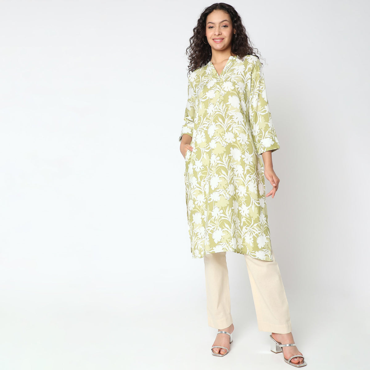 Women Wearing Straight Fit Solid Kurta