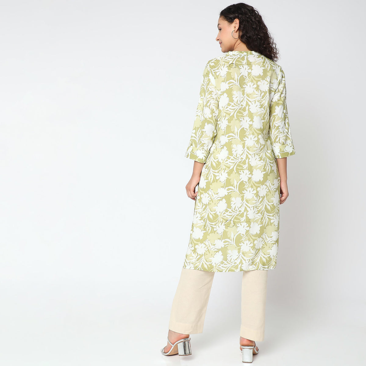 Women Wearing Straight Fit Solid Kurta