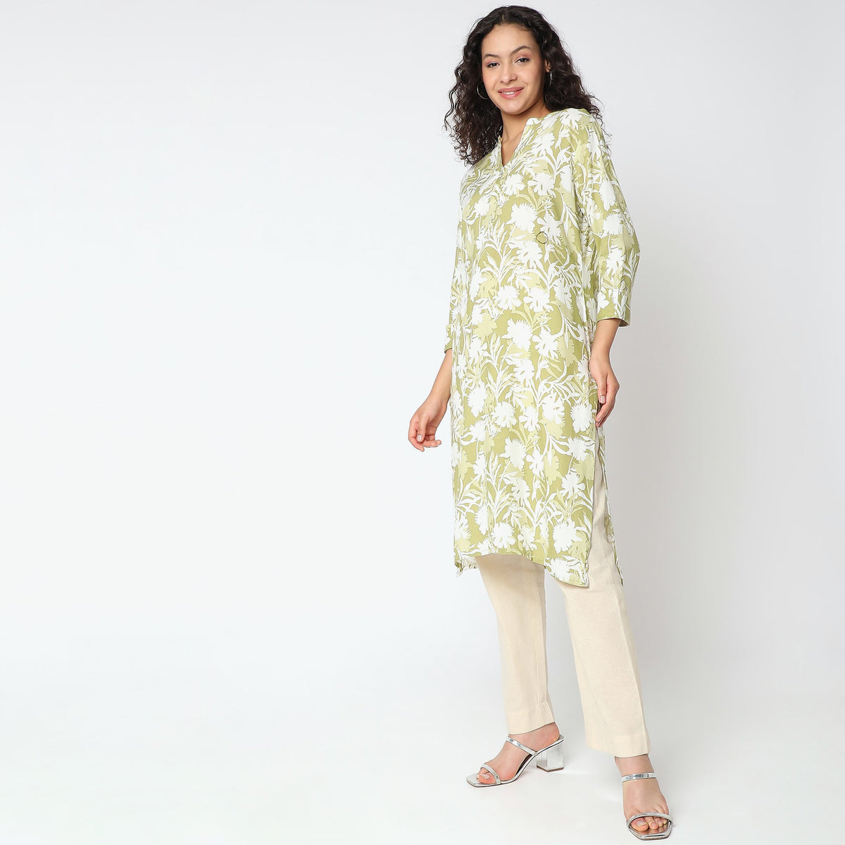 Women Wearing Straight Fit Solid Kurta