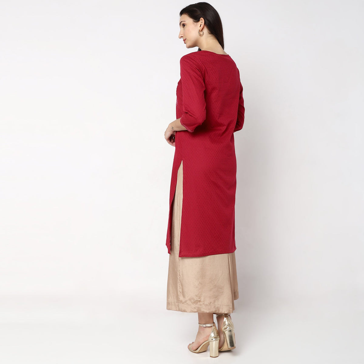 Women Wearing Straight Fit Solid Kurta