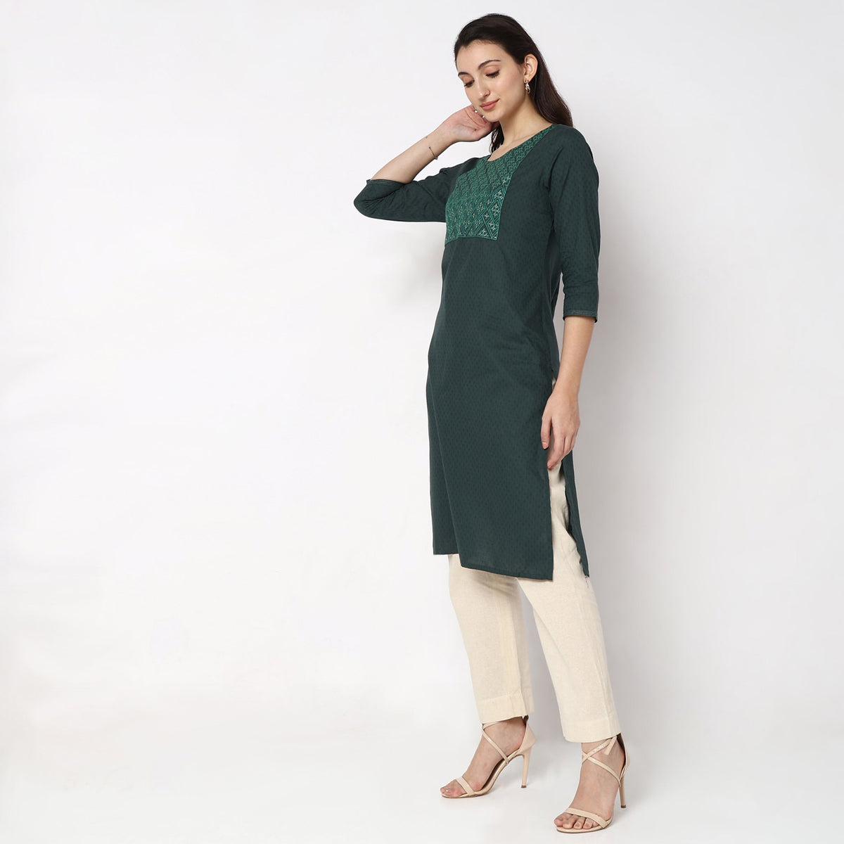 Women Wearing Straight Fit Solid Kurta