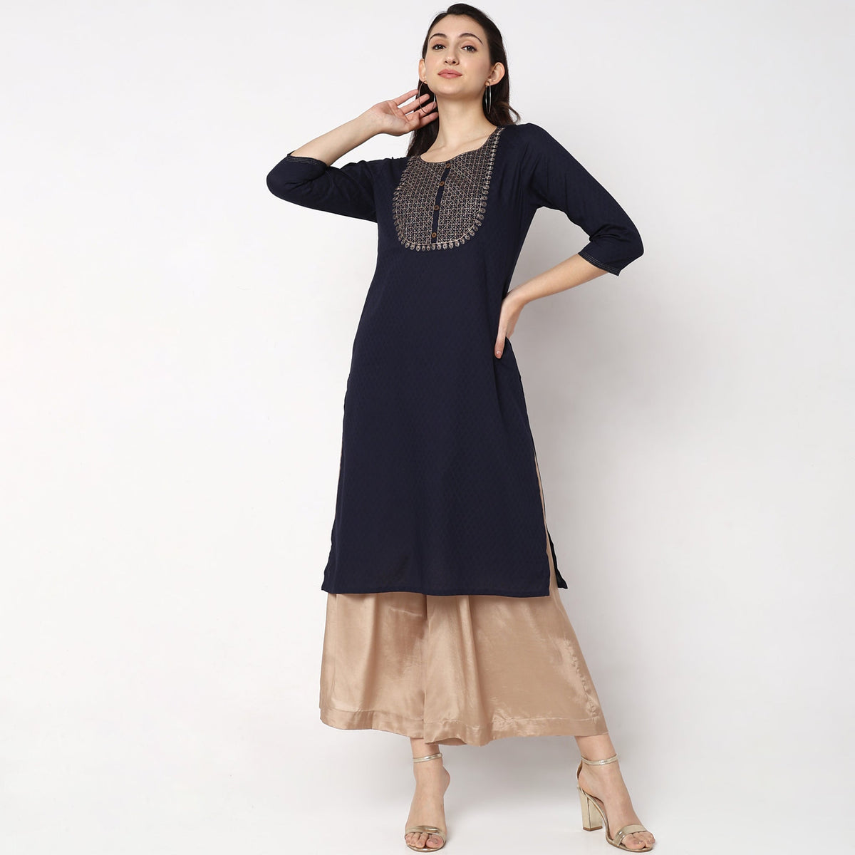 Women Wearing Straight Fit Solid Kurta