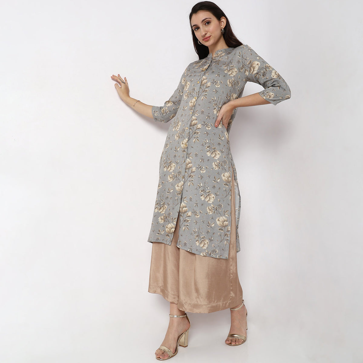 Women Wearing Straight Fit Solid Kurta