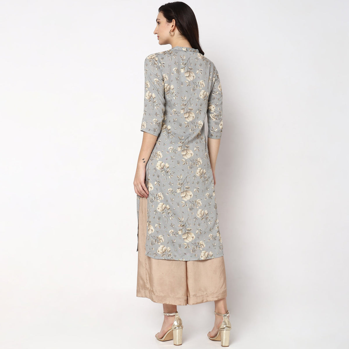 Women Wearing Straight Fit Solid Kurta