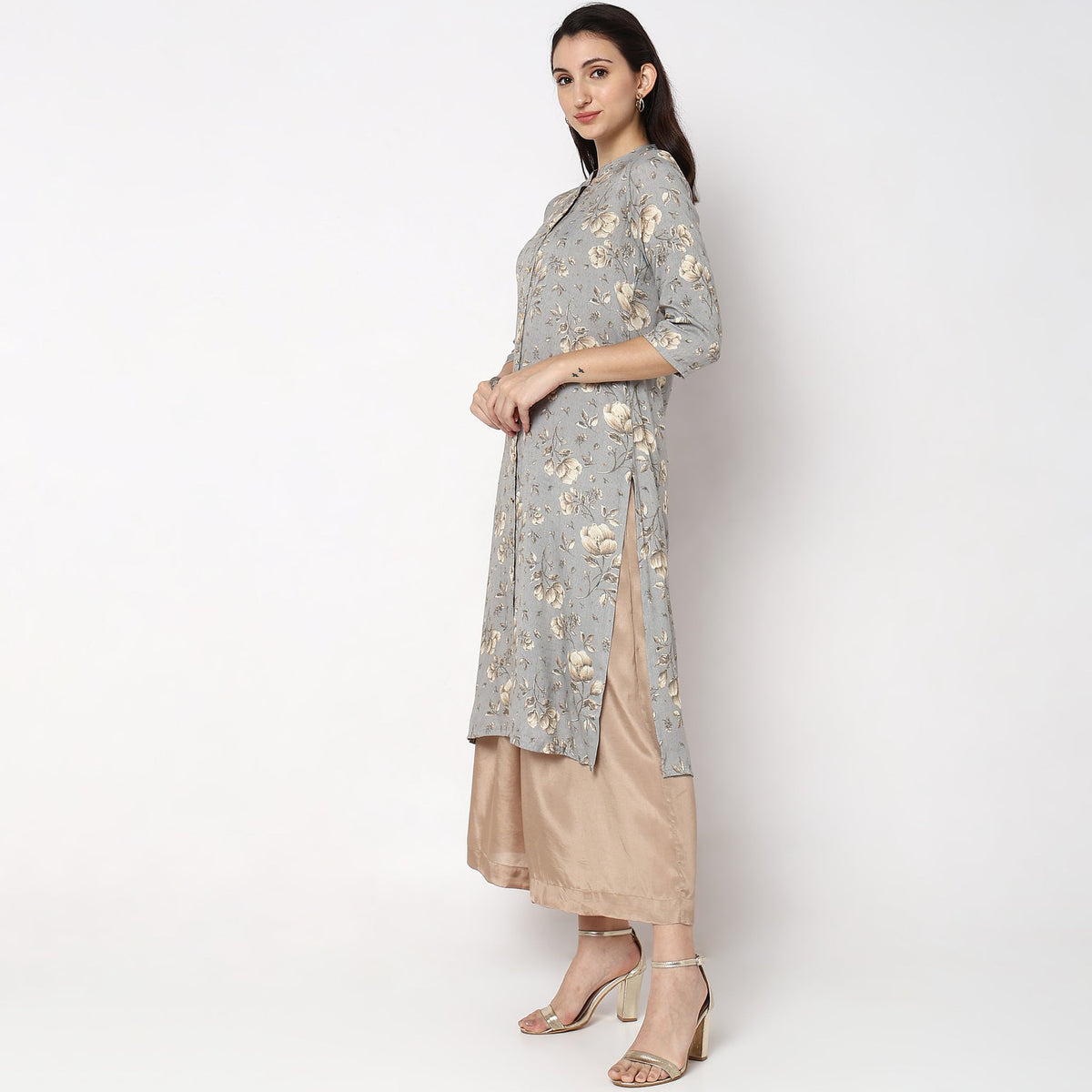 Women Wearing Straight Fit Solid Kurta