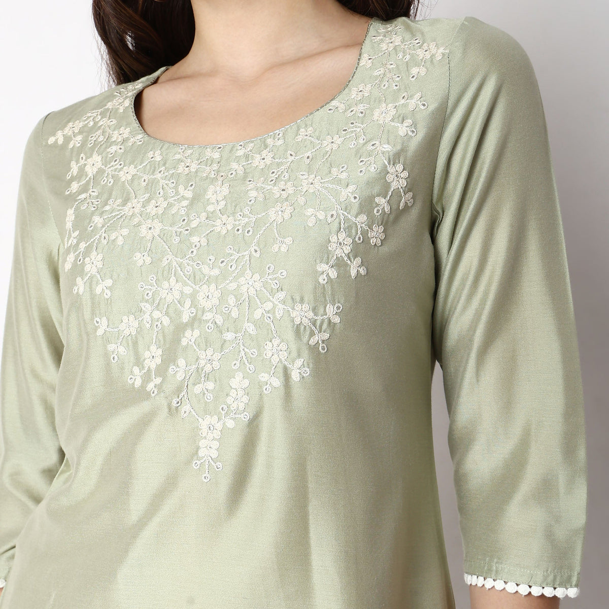 Women Wearing Straight Fit Embroidered Kurta