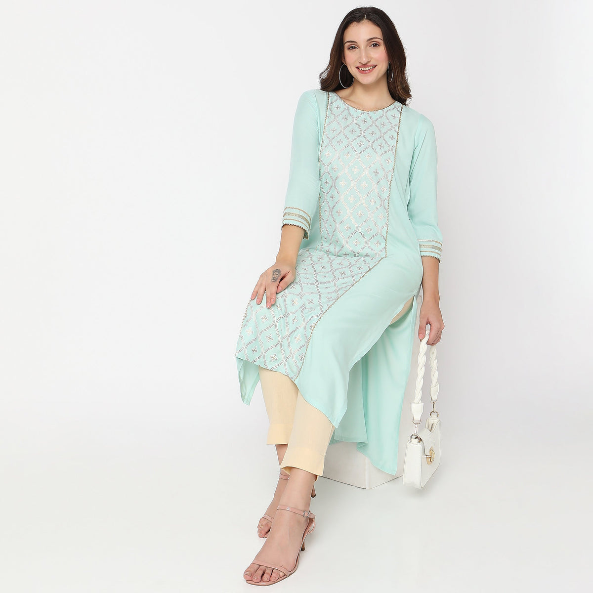 Women Wearing Straight Fit Embellished Kurta