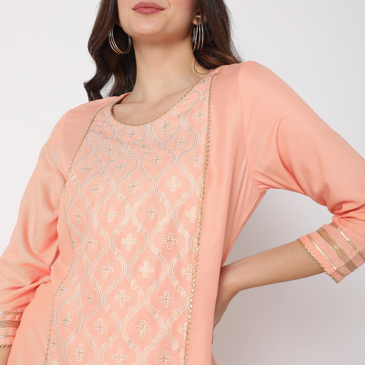 Women Wearing Straight Fit Embellished Kurta