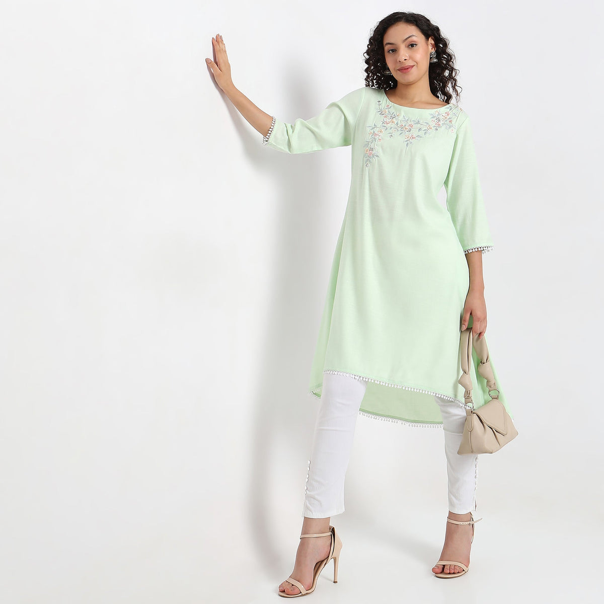 Women Wearing Flare Fit Embroidered Kurta