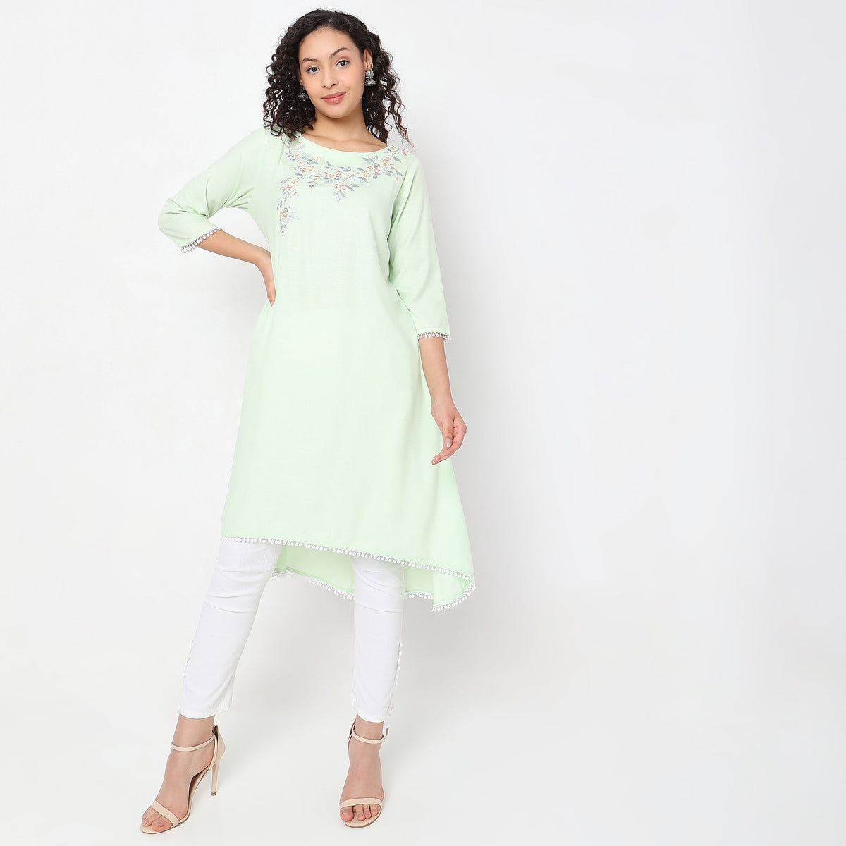 Women Wearing Flare Fit Embroidered Kurta