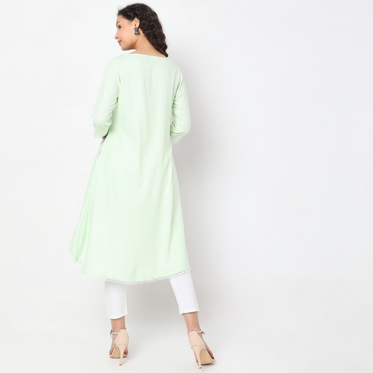 Women Wearing Flare Fit Embroidered Kurta