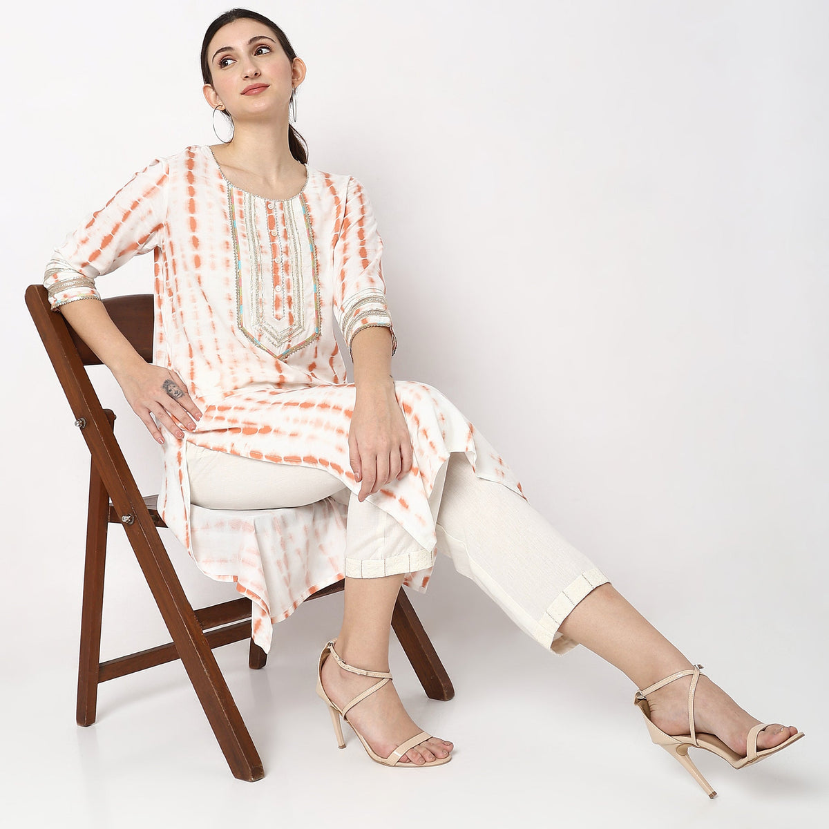 Women Wearing Straight Fit Printed Kurta