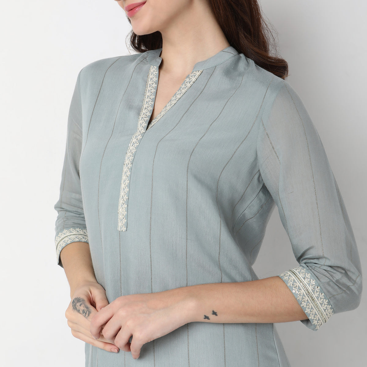 Women Wearing Straight Fit Embroidered Kurta