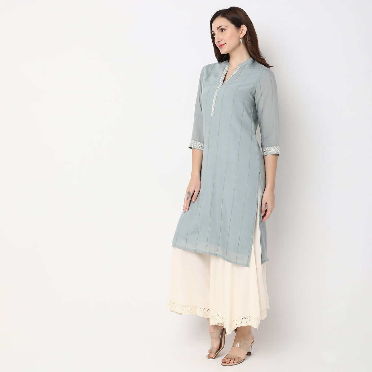 Women Wearing Straight Fit Embroidered Kurta