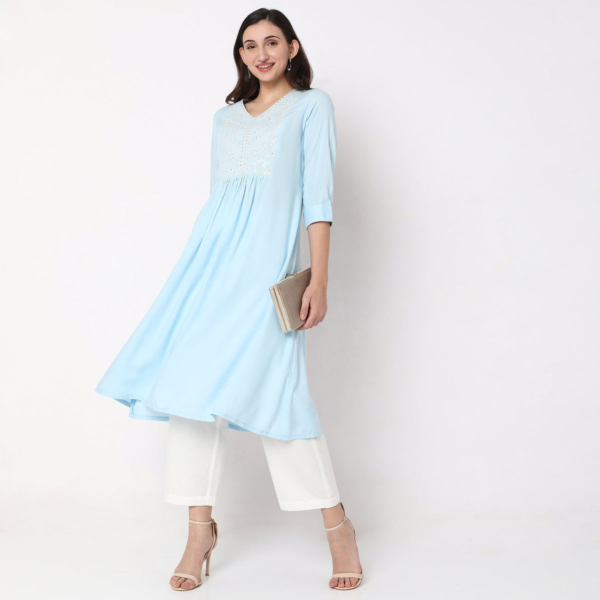 Women Wearing Flare Fit Embroidered Kurta