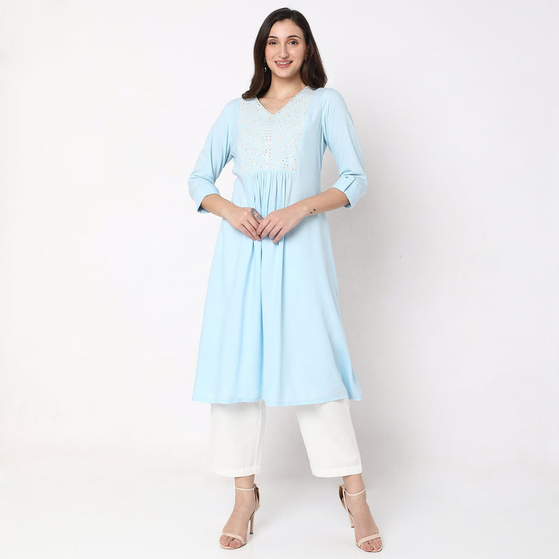 Women Wearing Flare Fit Embroidered Kurta