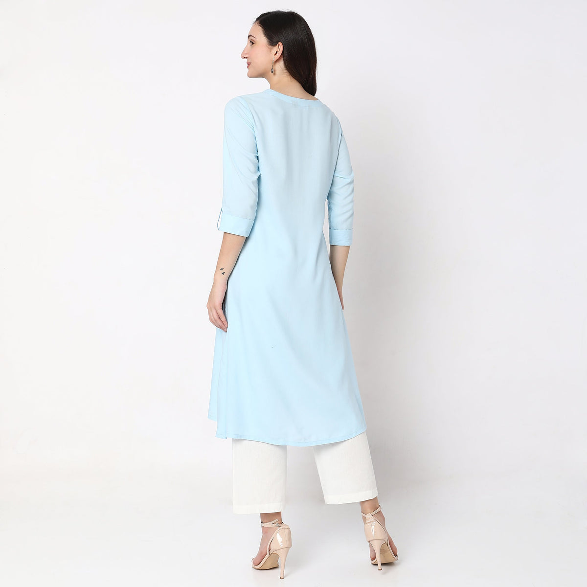 Women Wearing Flare Fit Embroidered Kurta