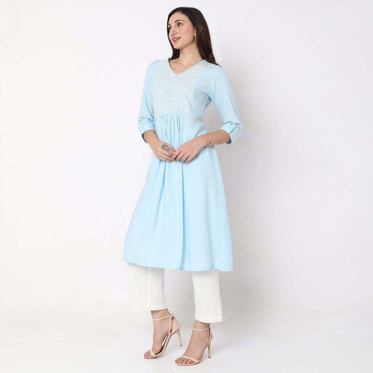 Women Wearing Flare Fit Embroidered Kurta